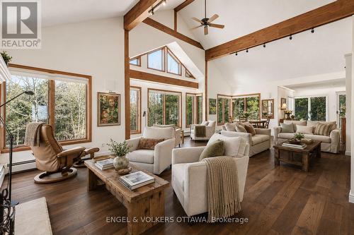 Virtually staged with hardwood (estimate on file) - 4637 Northwoods Drive, Ottawa, ON - Indoor Photo Showing Living Room