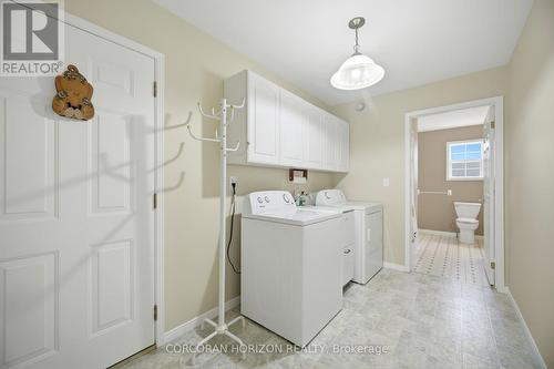 Main floor laundry w/access to ensuite & garage - 71 Grayview Drive, Grey Highlands, ON - Indoor Photo Showing Laundry Room
