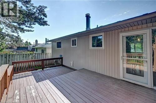 Expansive outdoor deck featuring wood flooring and a brown wood railing - 92 Pinemeadow Crescent, Waterloo, ON - Outdoor With Deck Patio Veranda With Exterior