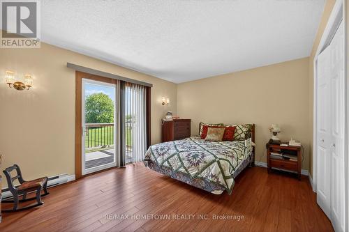 Primary bedroom with outdoor deck - 4523 Kilkenny Road, Elizabethtown-Kitley, ON - Indoor Photo Showing Bedroom
