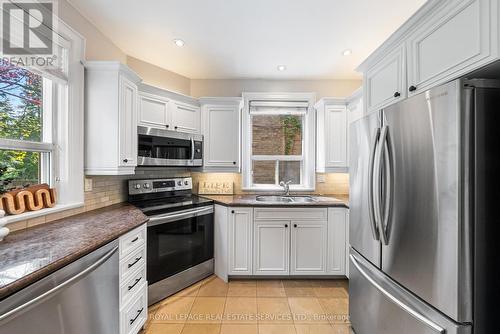 Kitchen w/ Freshly Painted Cabinets & S/S Appl. - 202 Dinnick Crescent, Toronto, ON 