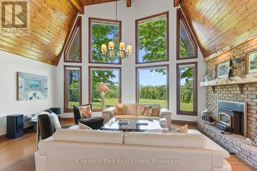 GREAT ROOM WITH VAULTED CEILINGS & COUNTRY VIEWS - 600380 Sideroad 50 N, Chatsworth, ON - Indoor Photo Showing Living Room With Fireplace