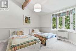 ADDITIONAL MAIN FLOOR BEDROOM - 