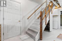 STAIRS TO LOWER LEVEL - 