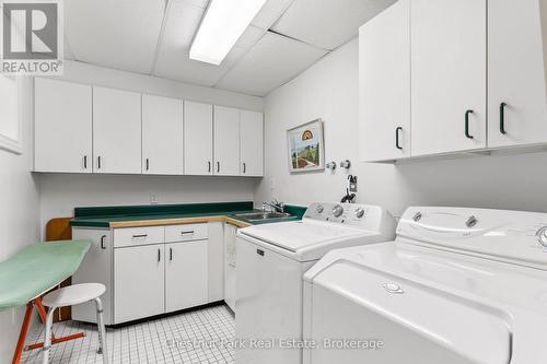 BRIGHT LAUNDRY ROOM - 600380 Sideroad 50 N, Chatsworth, ON - Indoor Photo Showing Laundry Room