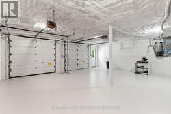INSIDE DOUBLE CAR ATTACHED GARAGE - 