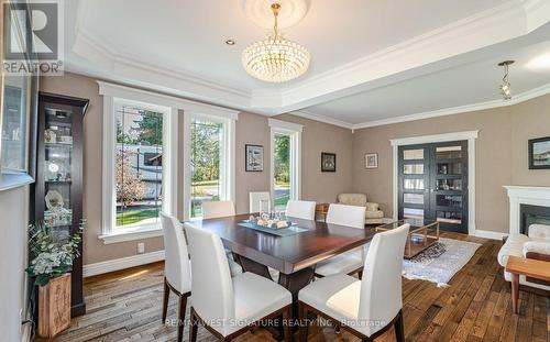 16070 Keele Street, King, ON - Indoor Photo Showing Dining Room With Fireplace