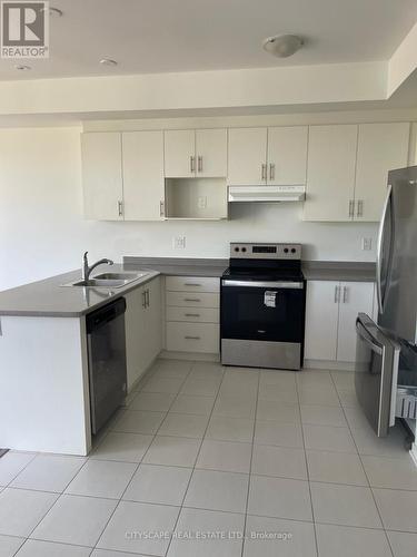 801 Heathrow Path, Oshawa, ON - Indoor Photo Showing Kitchen With Double Sink