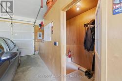 Garage entry from tunnel & stairs. - 