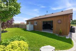 Spacious side yard perfect for kids & pets. - 