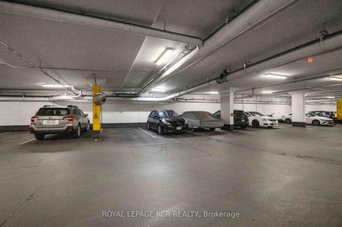 1702-100 John Street, Brampton, ON - Indoor Photo Showing Garage