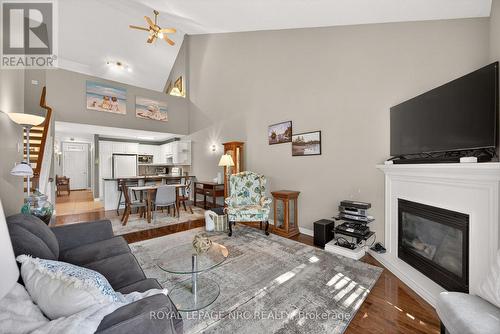9 - 4300 Kalar Road, Niagara Falls (Ascot), ON - Indoor Photo Showing Living Room With Fireplace