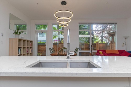 #103-9864 Fourth St, Sidney, BC - Indoor Photo Showing Kitchen With Double Sink