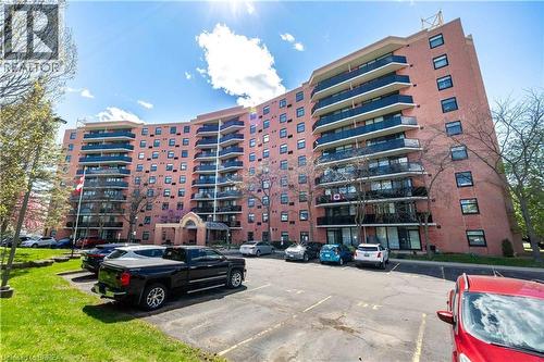 9 Bonheur Court Unit# 401, Brantford, ON - Outdoor With Balcony With Facade