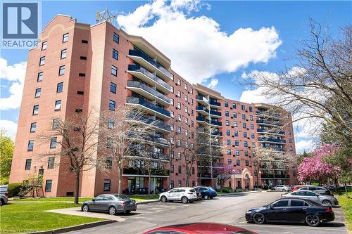 9 Bonheur Court Unit# 401, Brantford, ON - Outdoor With Balcony With Facade
