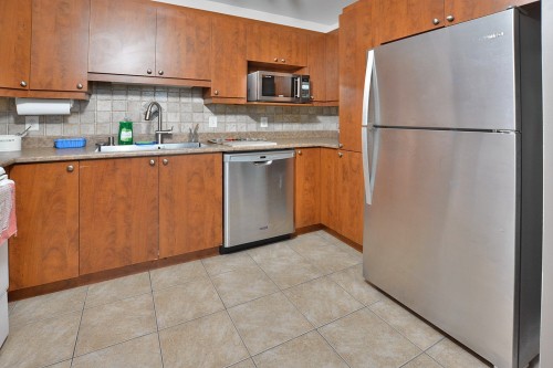 Kitchen - 001-2860 Rue Montcalm, Vaudreuil-Dorion, QC - Indoor Photo Showing Kitchen