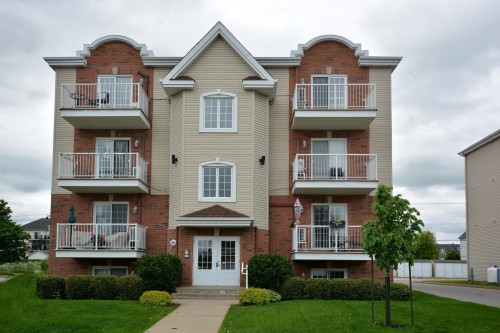 Front of Structure - 001-2860 Rue Montcalm, Vaudreuil-Dorion, QC - Outdoor With Facade