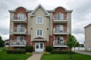 Front of Structure - 001-2860 Rue Montcalm, Vaudreuil-Dorion, QC  - Outdoor With Facade 