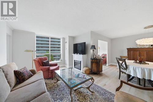 606 - 442 Maple Ave. Avenue, Burlington, ON - Indoor Photo Showing Living Room With Fireplace