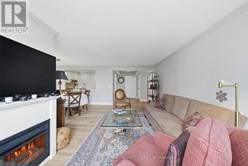 606 - 442 Maple Ave. Avenue, Burlington, ON - Indoor Photo Showing Living Room With Fireplace