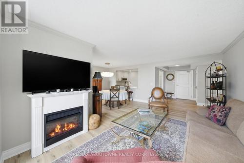 606 - 442 Maple Ave. Avenue, Burlington, ON - Indoor Photo Showing Living Room With Fireplace