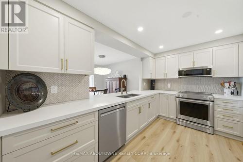 606 - 442 Maple Ave. Avenue, Burlington, ON - Indoor Photo Showing Kitchen With Double Sink