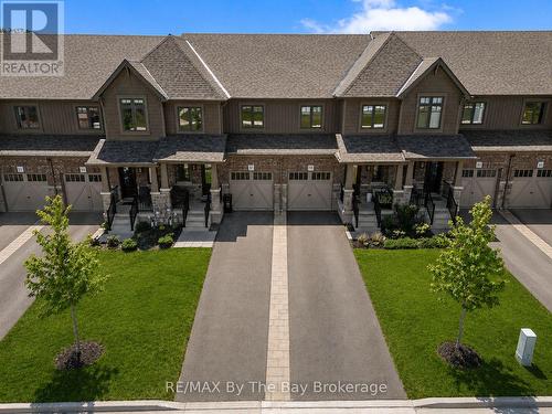 Yard has been virtually enhanced - 59 Archer Avenue, Collingwood, ON - Outdoor With Deck Patio Veranda With Facade