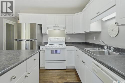 105 615 Mcwillie Avenue, Saskatoon, SK - Indoor Photo Showing Kitchen With Double Sink
