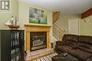 Living Room - 2 Ridout Court, Tiny, ON  - Indoor Photo Showing Living Room With Fireplace 