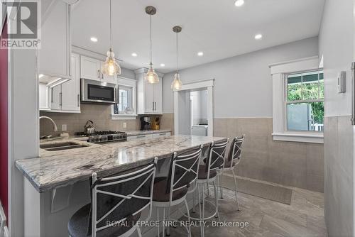 Gleaming quartz countertops in kitchen. - 260 Main Street E, Grimsby (Grimsby East), ON - Indoor Photo Showing Kitchen With Double Sink With Upgraded Kitchen