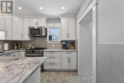 So much cupboard space. - 260 Main Street E, Grimsby (Grimsby East), ON - Indoor Photo Showing Kitchen With Upgraded Kitchen
