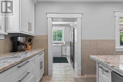 From kitchen into main floor laundry and mudroom. - 260 Main Street E, Grimsby (Grimsby East), ON - Indoor Photo Showing Kitchen