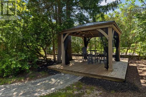 Private gazebo area.Pathway has landscape lighting - 260 Main Street E, Grimsby (Grimsby East), ON - Outdoor