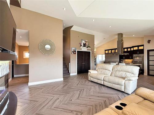34 Lakeview Drive, Brandon, MB - Indoor Photo Showing Living Room With Fireplace