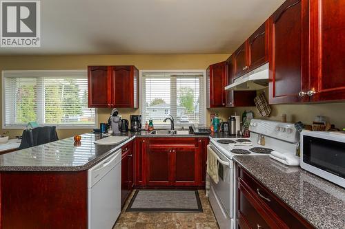 1321 Douglas Street, Prince George, BC - Indoor Photo Showing Kitchen With Double Sink