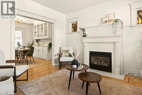 106 Grosvenor Avenue N, Hamilton, ON - Indoor Photo Showing Living Room With Fireplace