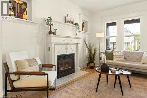 106 Grosvenor Avenue N, Hamilton, ON - Indoor Photo Showing Living Room With Fireplace