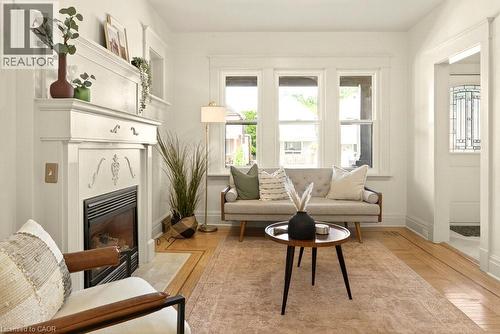 106 Grosvenor Avenue N, Hamilton, ON - Indoor Photo Showing Living Room With Fireplace