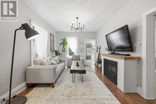 23 East 21St Street, Hamilton, ON - Indoor Photo Showing Living Room With Fireplace