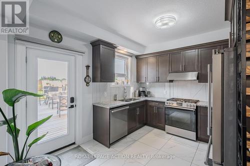 87 Grandville Circle, Brant, ON - Indoor Photo Showing Kitchen With Double Sink