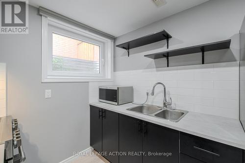 87 Grandville Circle, Brant, ON - Indoor Photo Showing Kitchen With Double Sink