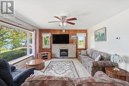 906 N Big Island Road, Prince Edward County (Sophiasburg Ward), ON - Indoor Photo Showing Living Room With Fireplace