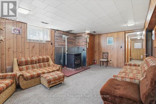 906 N Big Island Road, Prince Edward County (Sophiasburg Ward), ON - Indoor Photo Showing Basement With Fireplace