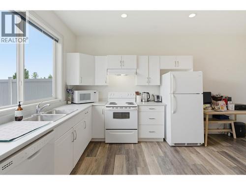 Suite Kitchen - 536 Tungsten Court, Kelowna, BC - Indoor Photo Showing Kitchen With Double Sink