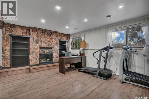 3831 Taylor Street E, Saskatoon, SK - Indoor Photo Showing Gym Room With Fireplace