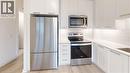 Gorgeous modern kitchen - 385 Winston Road Unit# 709, Grimsby, ON  - Indoor Photo Showing Kitchen With Upgraded Kitchen 