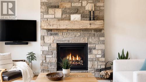 Family Room Fireplace - 70 Plewes Drive, Collingwood, ON - Indoor Photo Showing Living Room With Fireplace