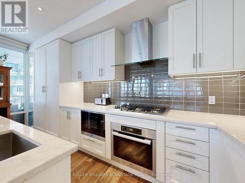 401 - 29 Queens Quay E, Toronto, ON - Indoor Photo Showing Kitchen With Upgraded Kitchen