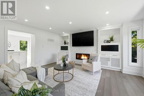 27 Chantelay Crescent, Halton Hills, ON - Indoor Photo Showing Living Room With Fireplace