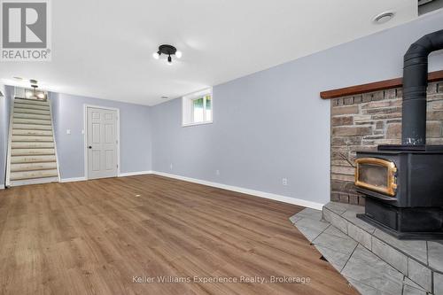 2555 Hodgins Road, Severn, ON - Indoor Photo Showing Other Room With Fireplace